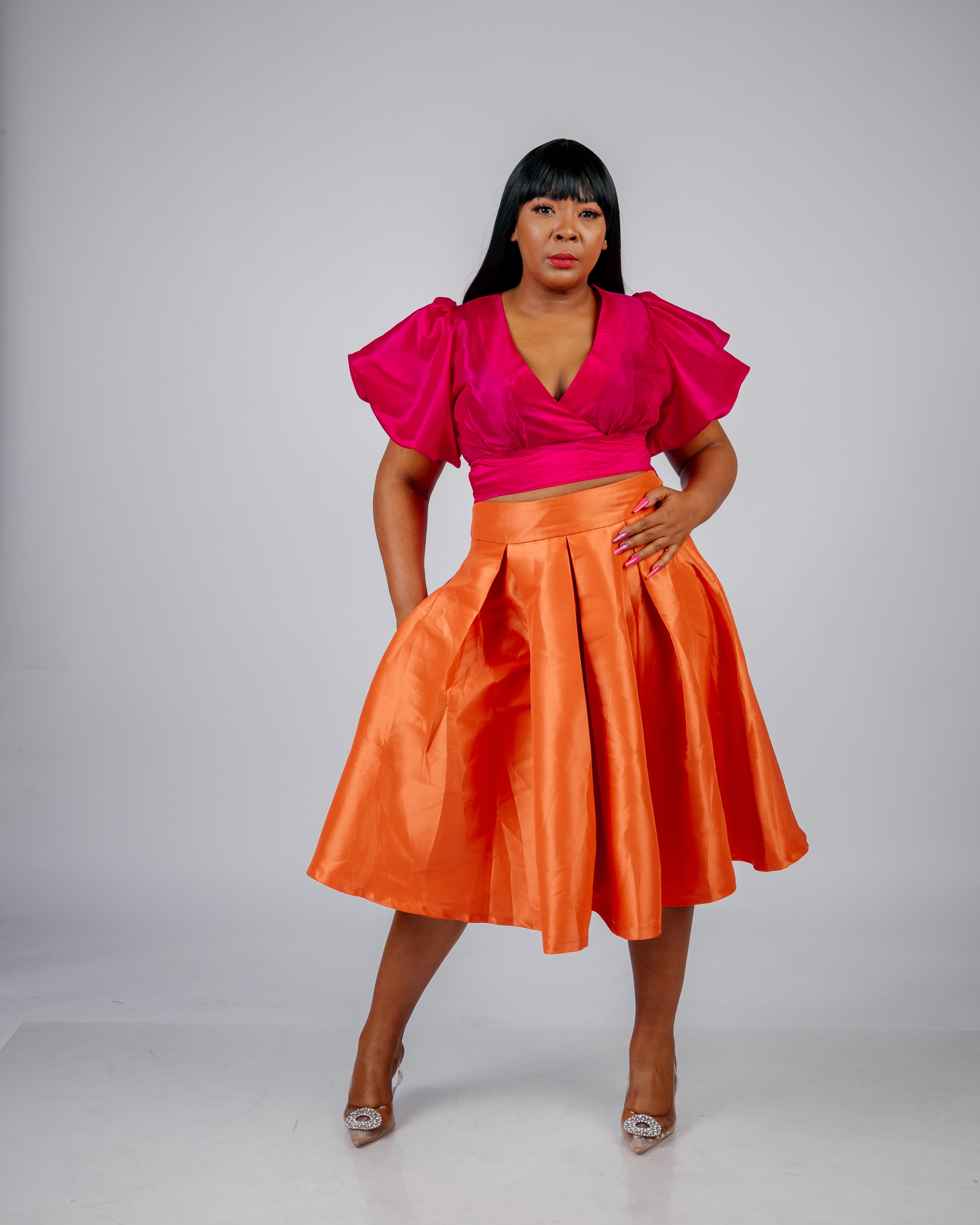 FRA20 ORANGE PLEATED SKIRT