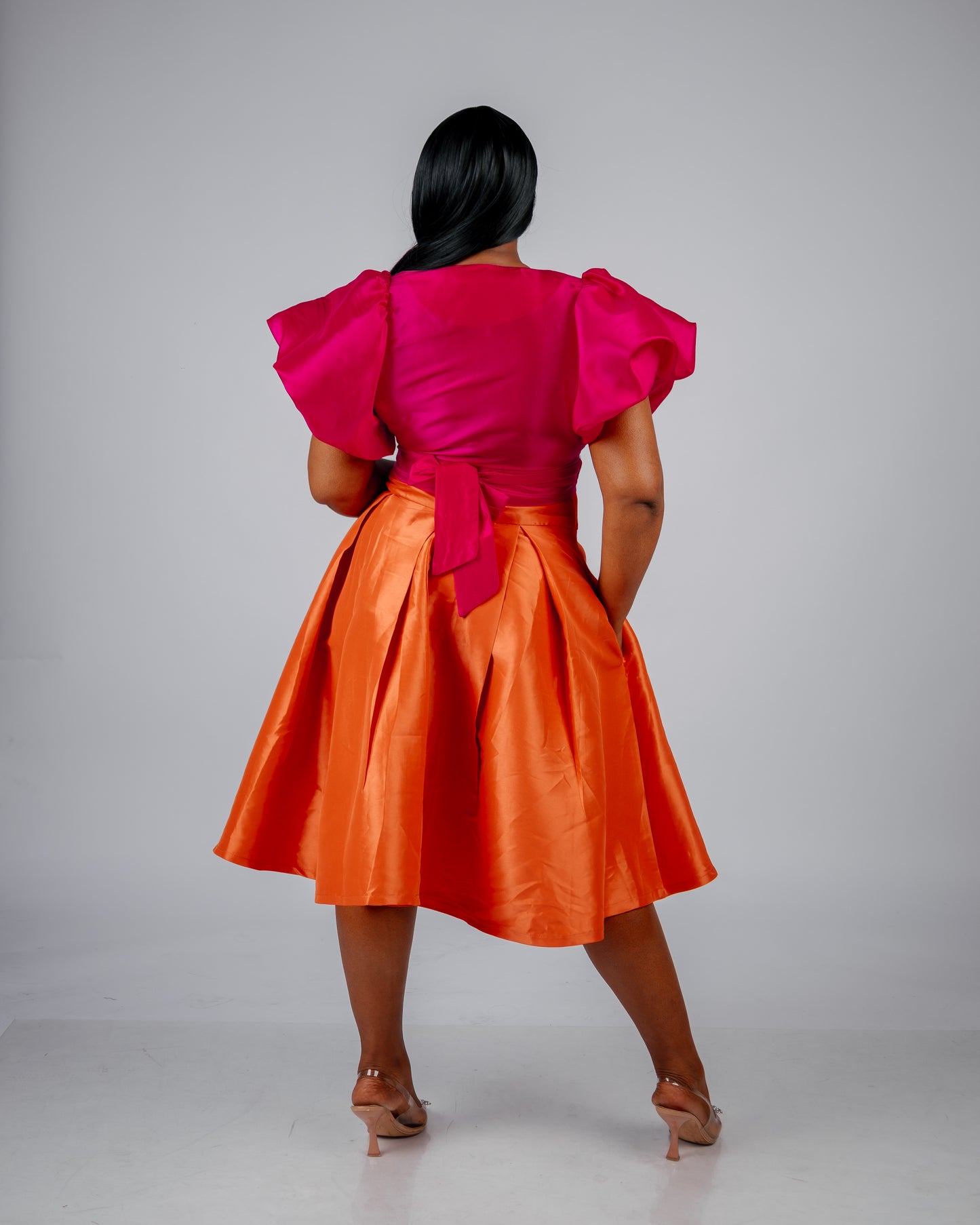 ORANGE PLEATED SKIRT