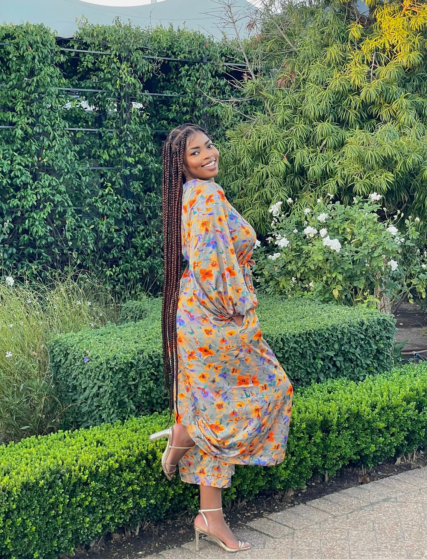 ORANGE FLORAL FRILLED LONG SLEEVED JUMPSUIT