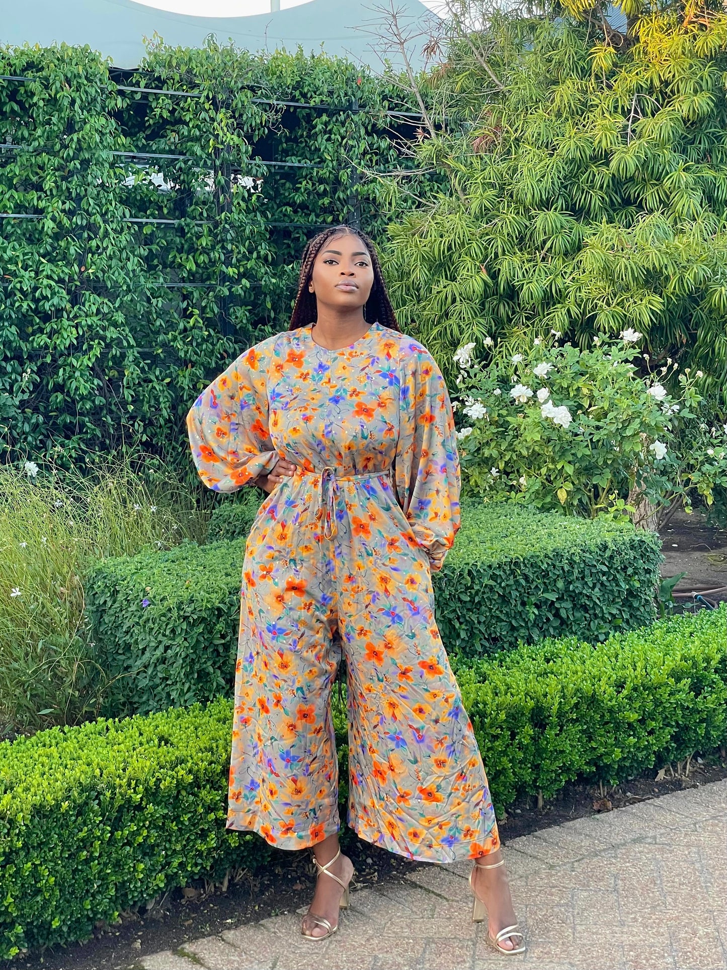 ORANGE FLORAL FRILLED LONG SLEEVED JUMPSUIT