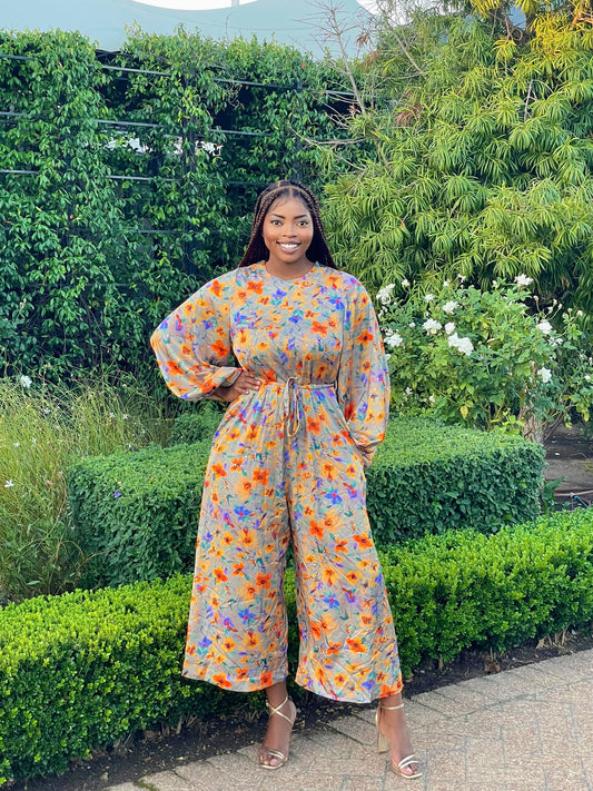 ORANGE FLORAL FRILLED LONG SLEEVED JUMPSUIT